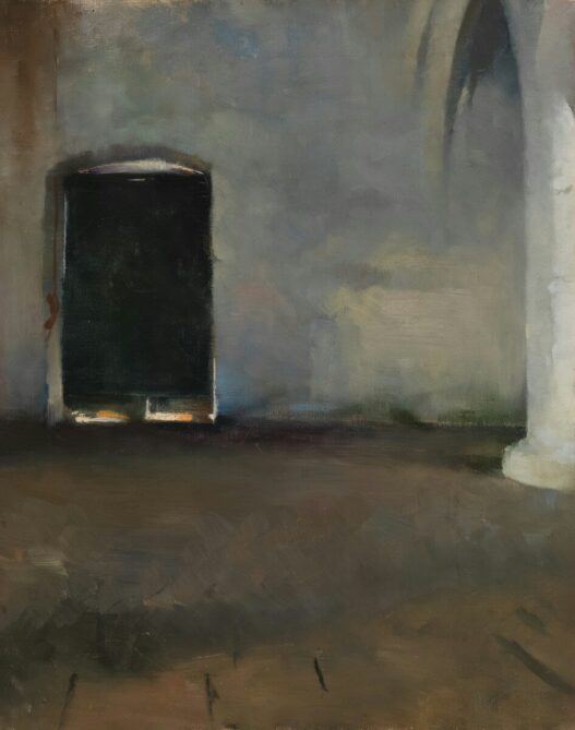 An old doorway with light shining through