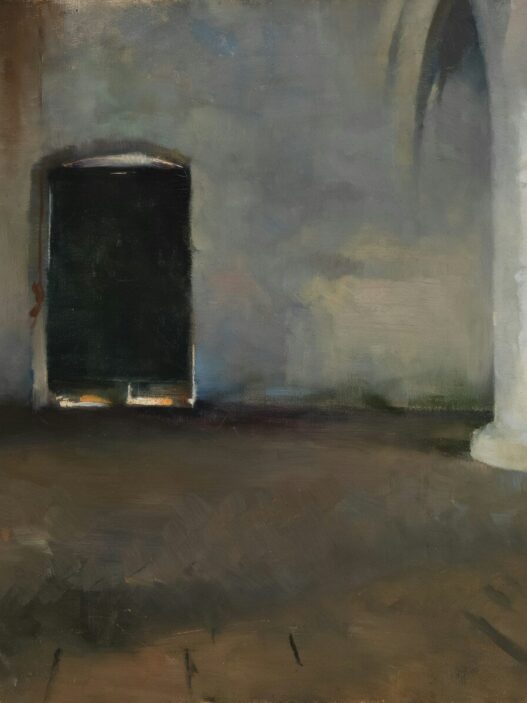 An old doorway with light shining through